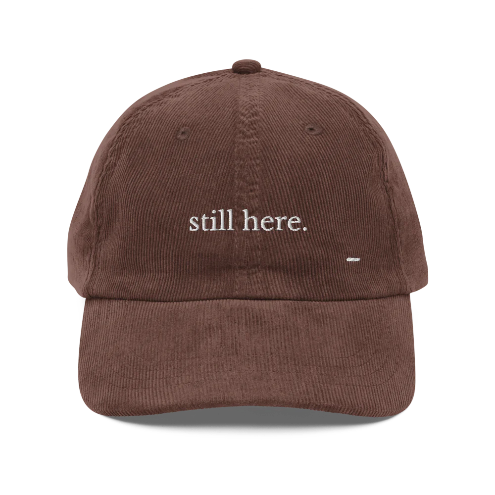 still here. corduroy cap