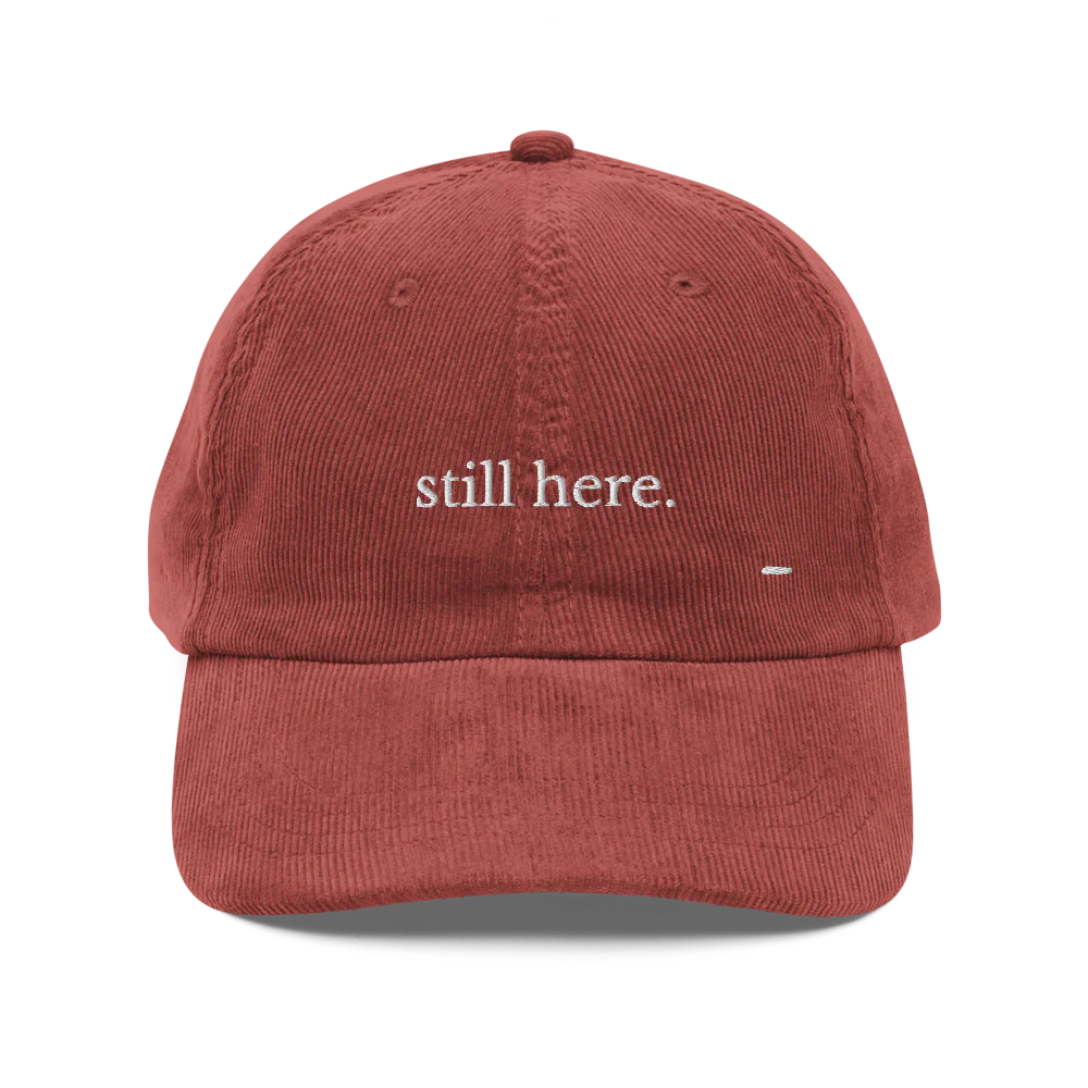 still here. corduroy cap