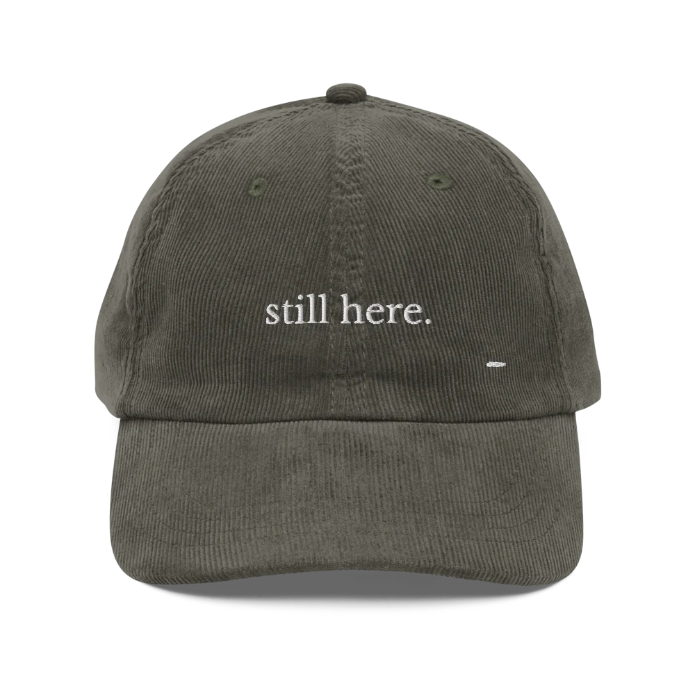 still here. corduroy cap