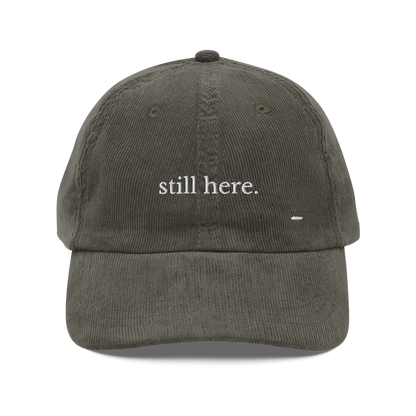 still here. corduroy cap