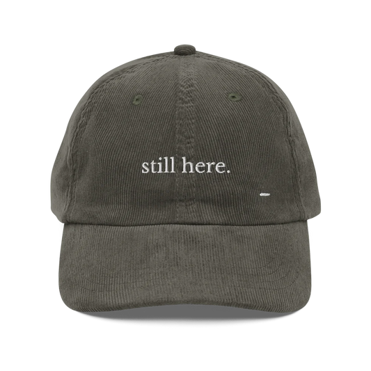 still here. corduroy cap