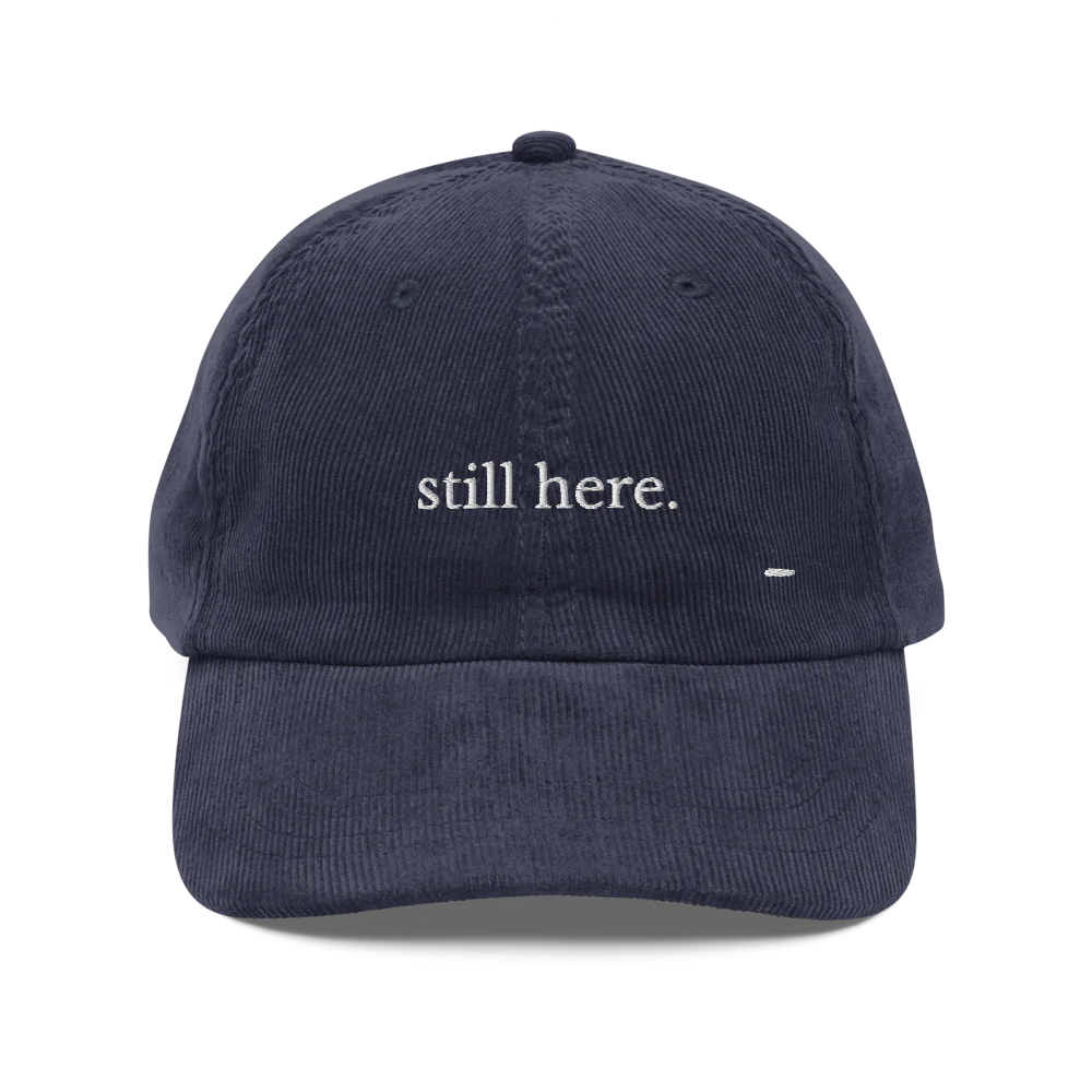 still here. corduroy cap