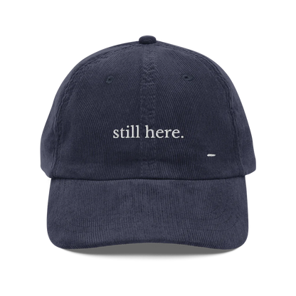 still here. corduroy cap