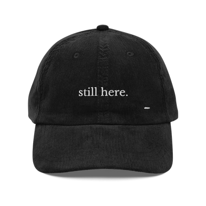 still here. corduroy cap